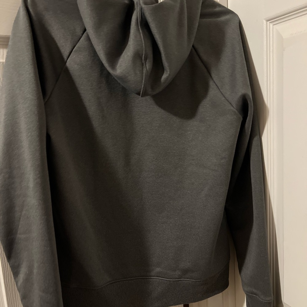 Womens Under Armour zip up hoodie  size medium  grey.